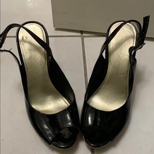 Jessica Simpson black shiny pumps.